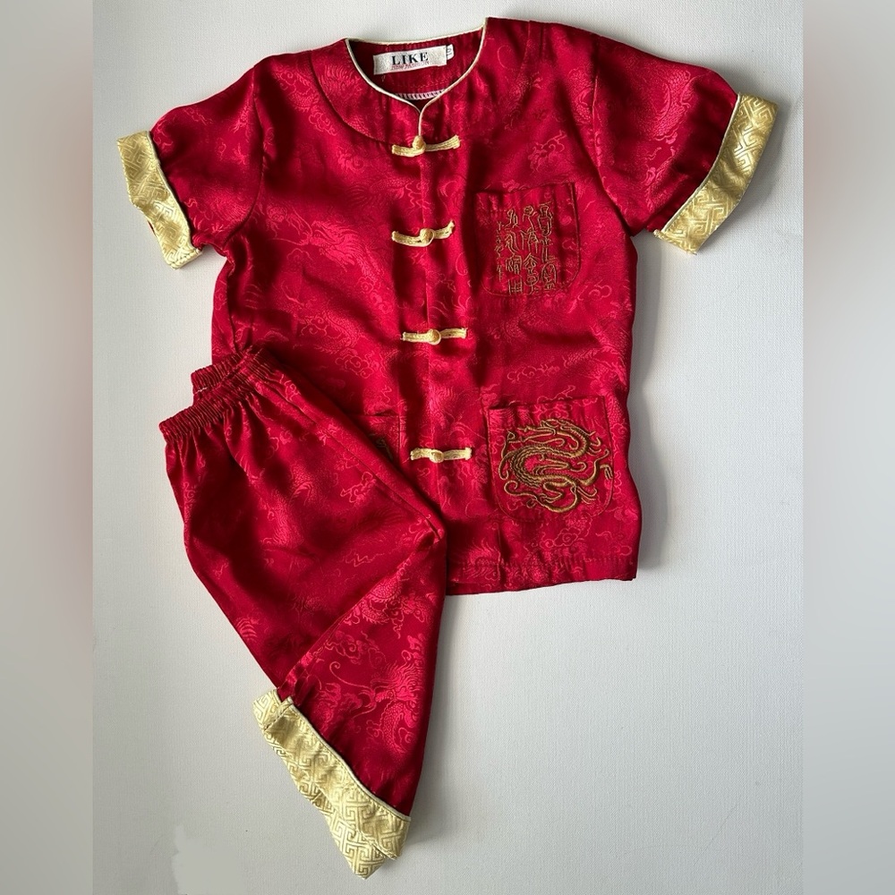 Like boy’s Chinese outfit,  two pieces set a short sleeved top. Size 10.
